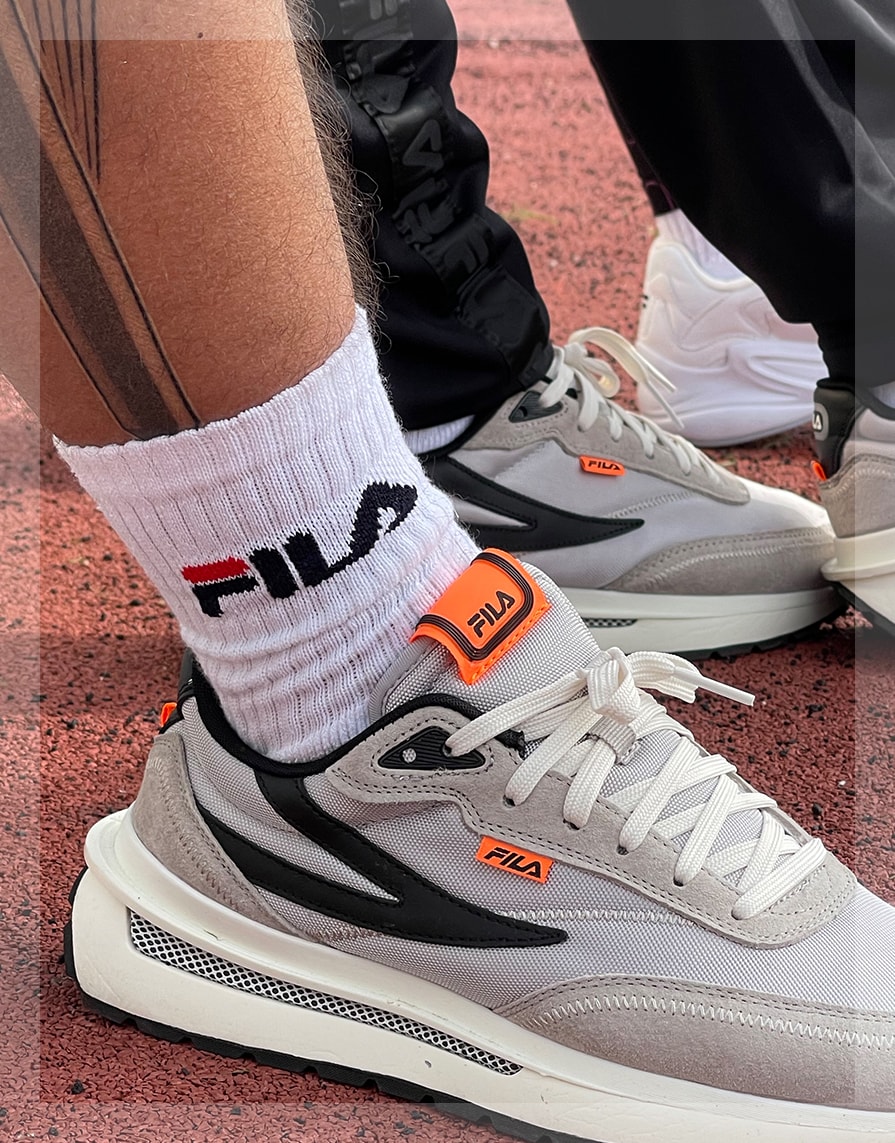 Fila socks and shoes in a gym